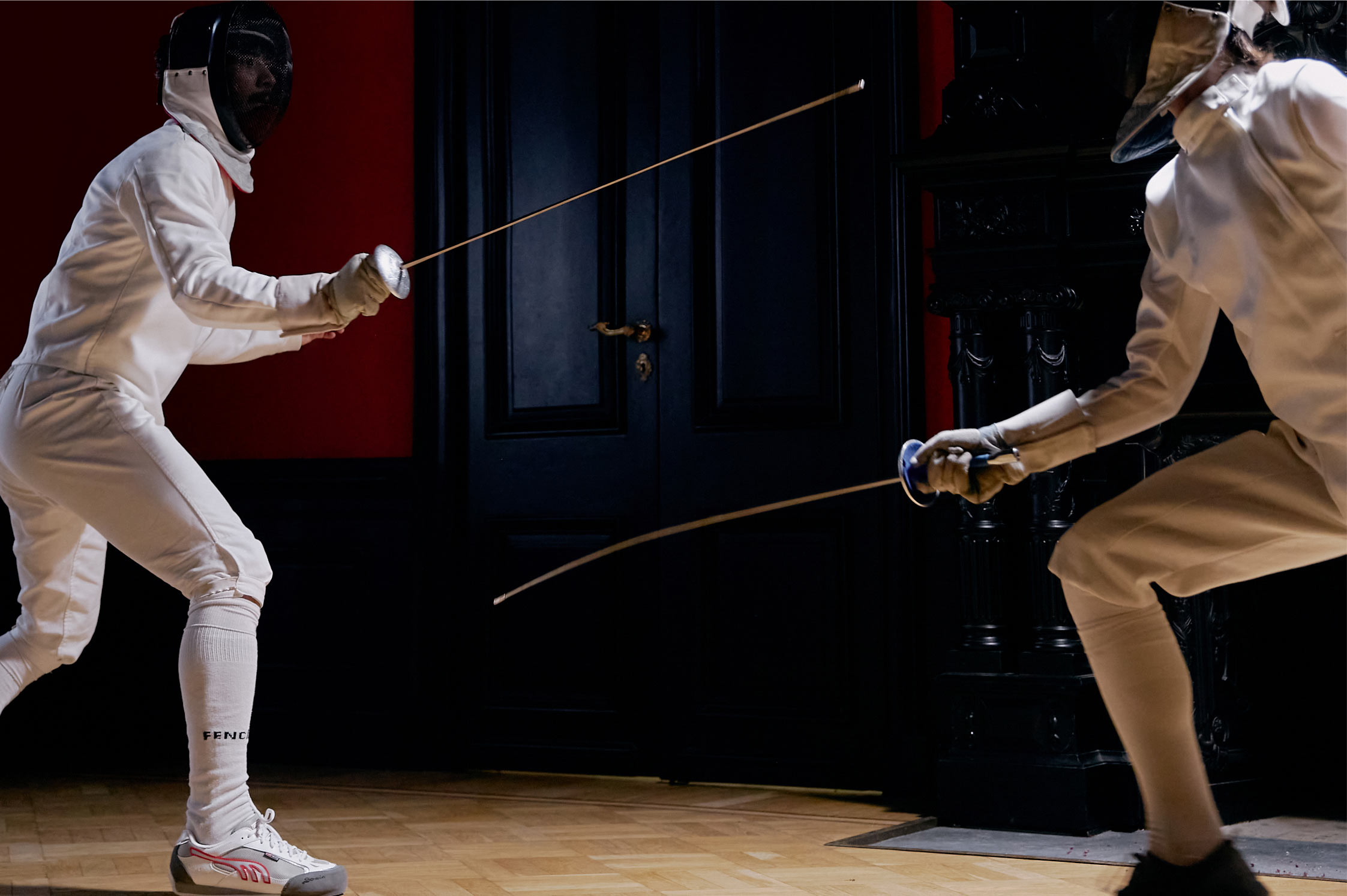 Двоє фехтувальників